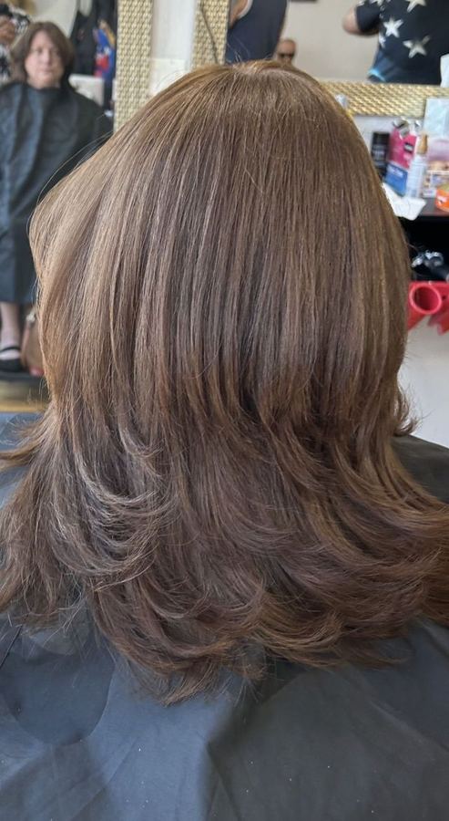 Long layered haircut at Masih.